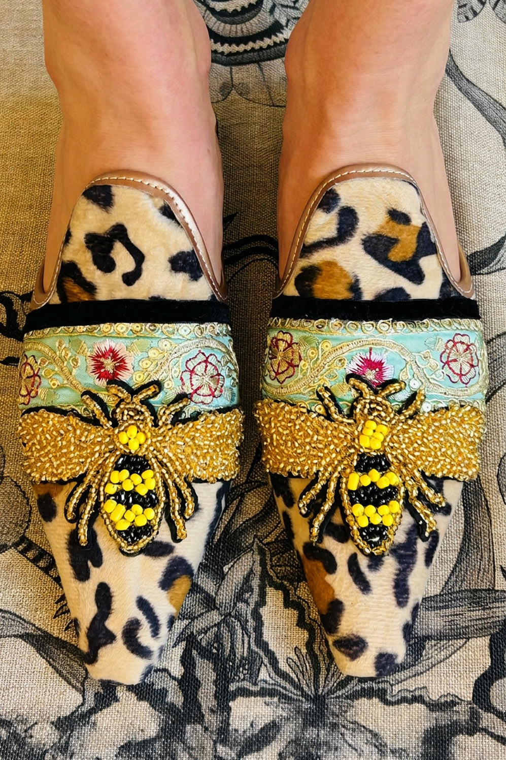 Leo with large beaded bee backless